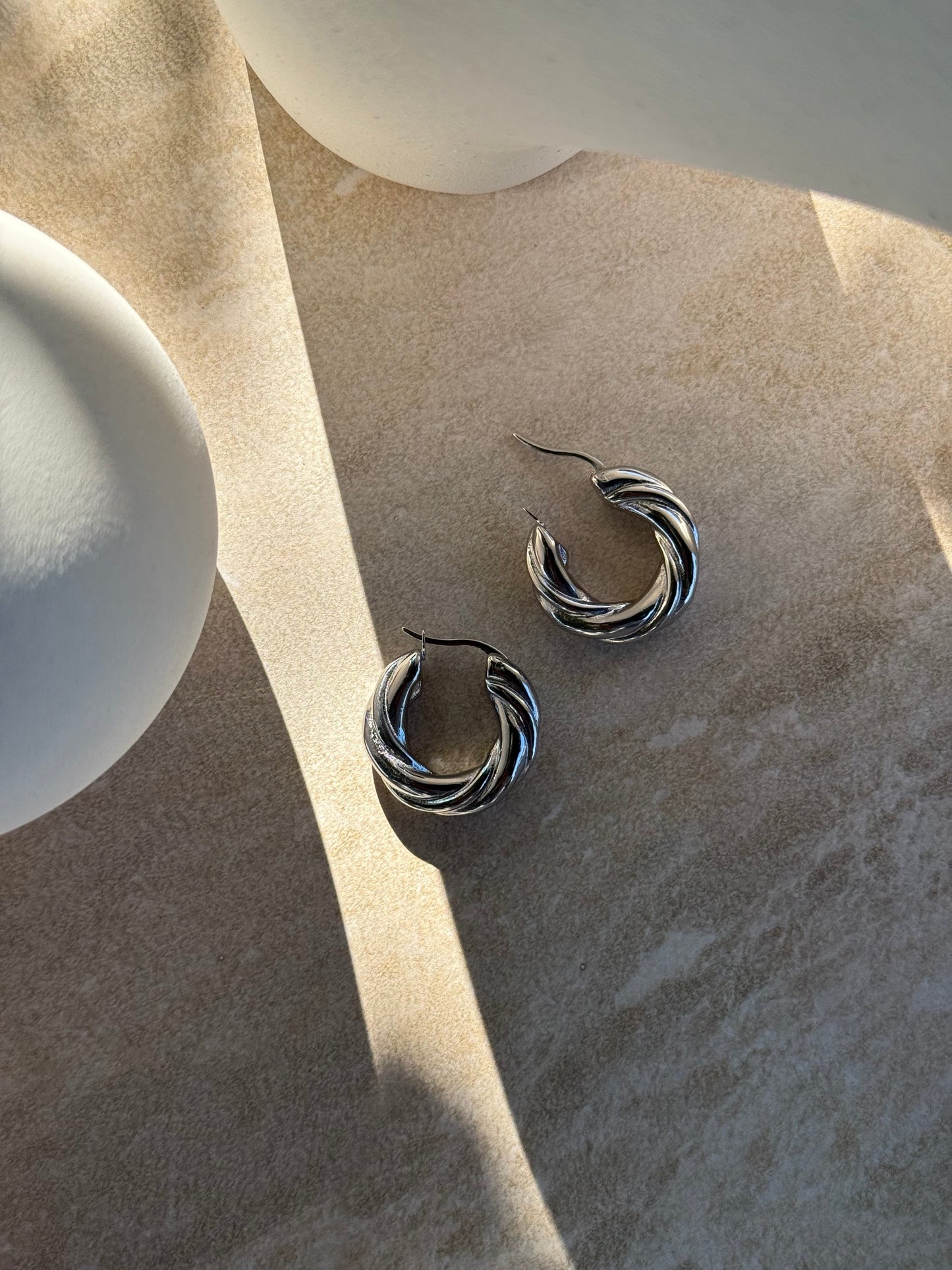 Tāwhirowhiro Silver Earrings